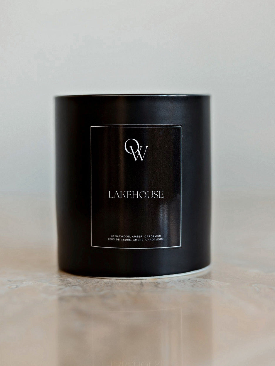 One Wednesday Lake House soy candle in a black vessel.